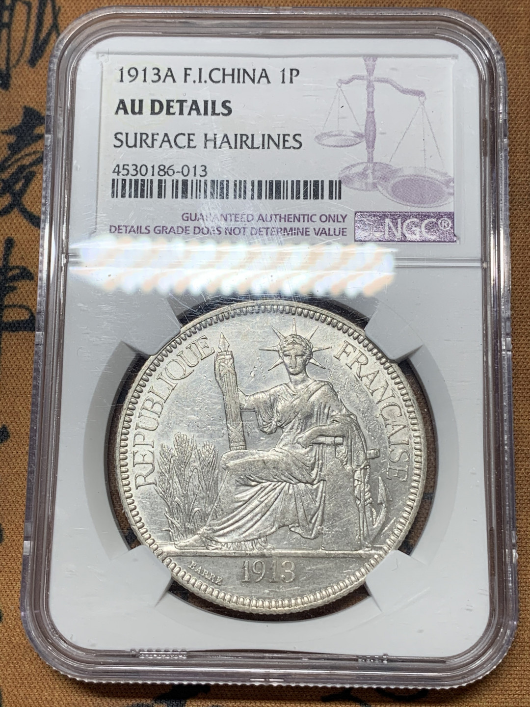 《竞宝斋》钱币微拍-第17场-本周日，周一2场连拍（全场顺丰包邮） NGC-AU 法属印度支那 1913年 坐洋 1元 银币 原光好品