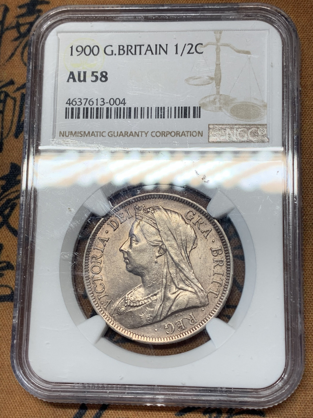 《竞宝斋》钱币微拍-第17场-本周日，周一2场连拍（全场顺丰包邮） NGC-AU58 英国 1900年 维多利亚披纱版 1/2克朗 银币 紫罗兰包浆