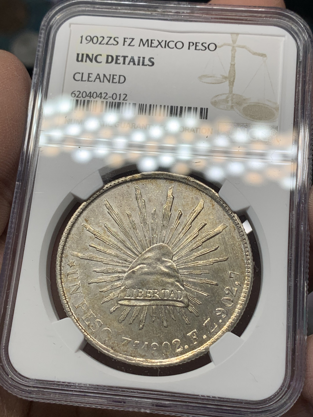 《竞宝斋》钱币微拍-第17场-本周日，周一2场连拍（全场顺丰包邮） NGC-UNCD 墨西哥1902年1比索  全羽好品