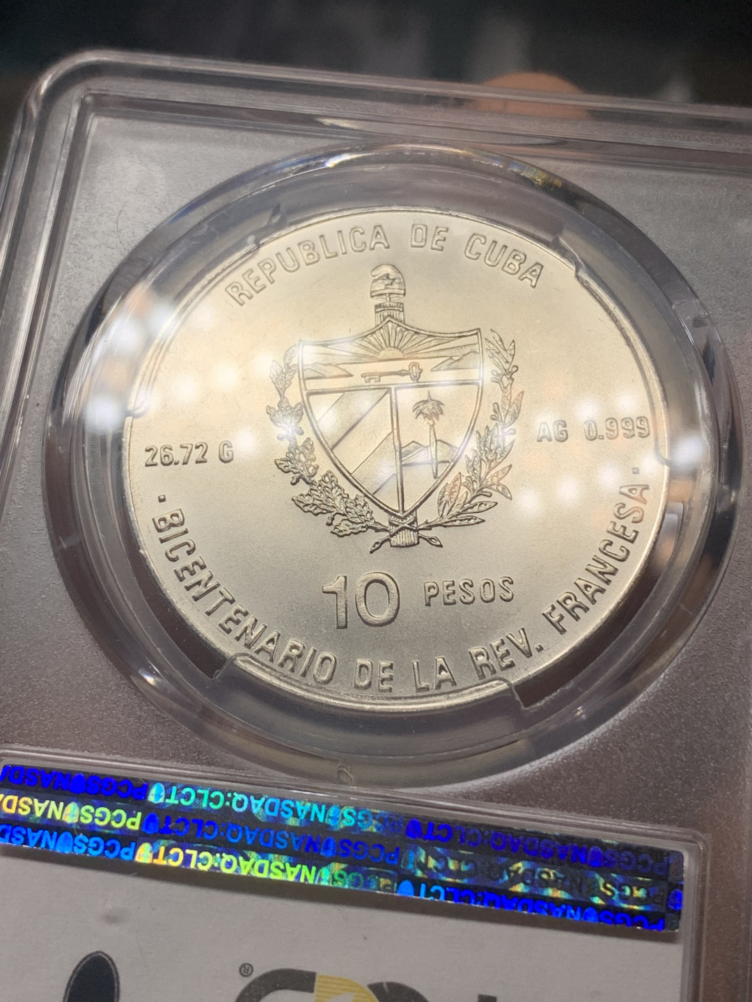 《竞宝斋》钱币微拍-第18场-本周日，周一2场连拍（全场顺丰包邮） PCGS MS65 古巴1989年圣女贞德10比索银币