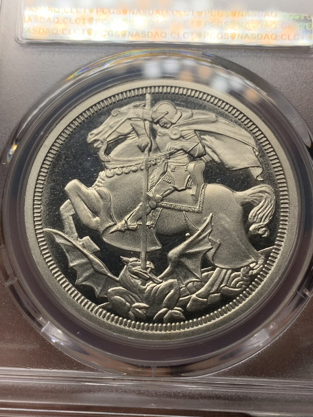 《竞宝斋》钱币微拍-第18场-本周日，周一2场连拍（全场顺丰包邮） PCGS PR66DCAM 英国1911年乔治五世马剑1克朗精制银币（2001后铸）珍稀币目录