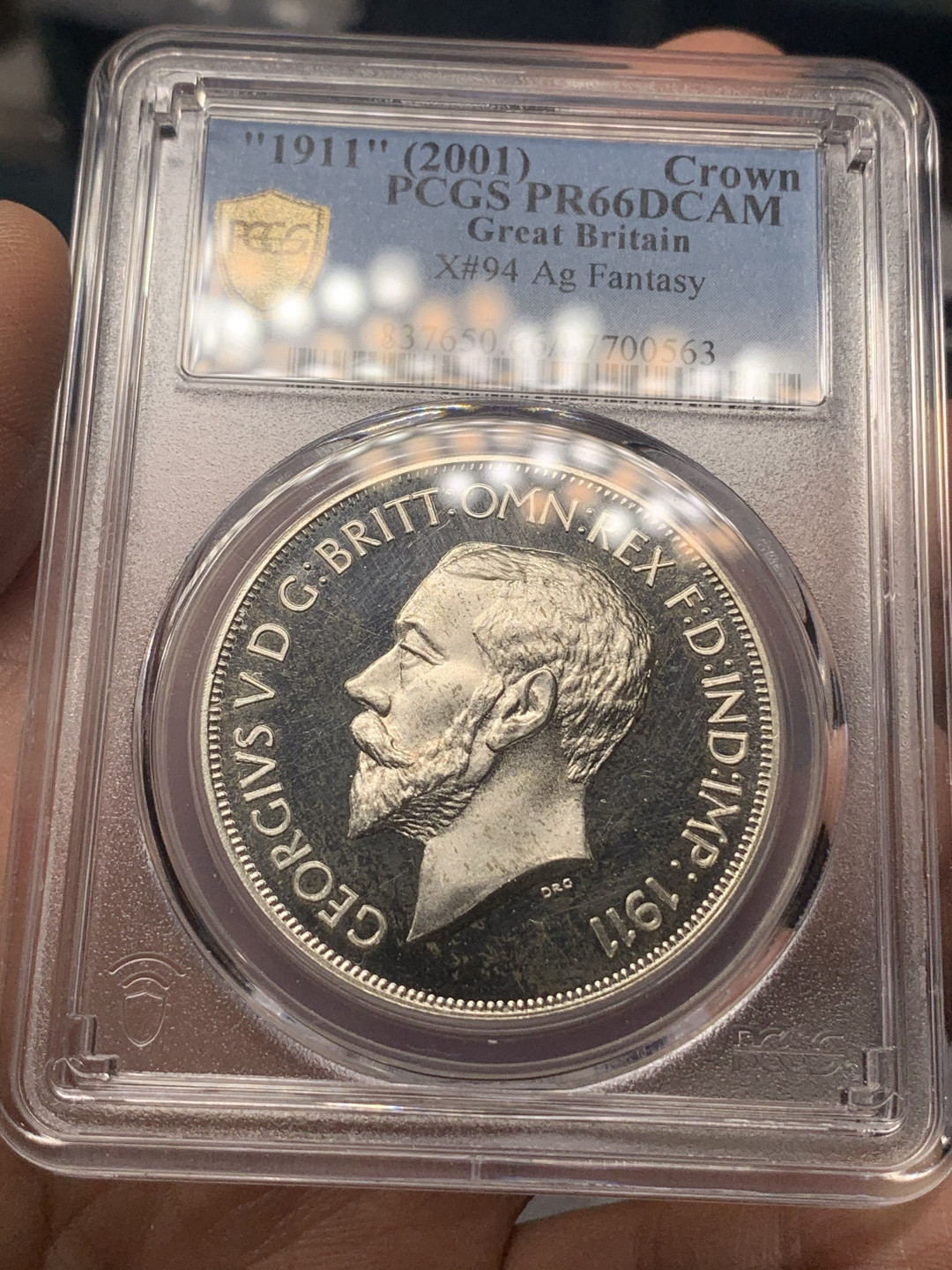 《竞宝斋》钱币微拍-第18场-本周日，周一2场连拍（全场顺丰包邮） PCGS PR66DCAM 英国1911年乔治五世马剑1克朗精制银币（2001后铸）珍稀币目录