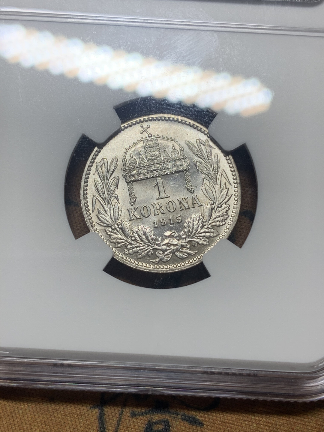 《竞宝斋》钱币微拍-第18场-本周日，周一2场连拍（全场顺丰包邮） NGC-MS62 奥匈银币 一对同分NGC错标1915年匈牙利1克朗 1914年奥地利1克朗 十字光度 给分急严