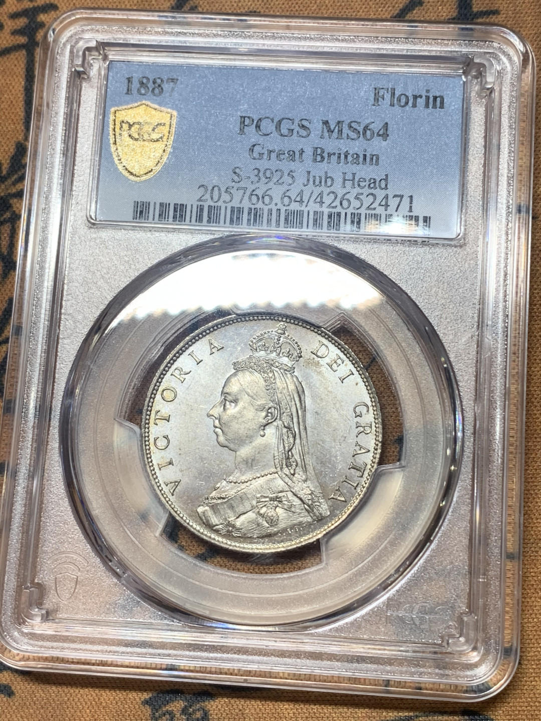 《竞宝斋》钱币微拍-第18场-本周日，周一2场连拍（全场顺丰包邮） PCGS MS64 英国1887年原光维多利亚高冠弗洛林银币 PL底板 细节很好