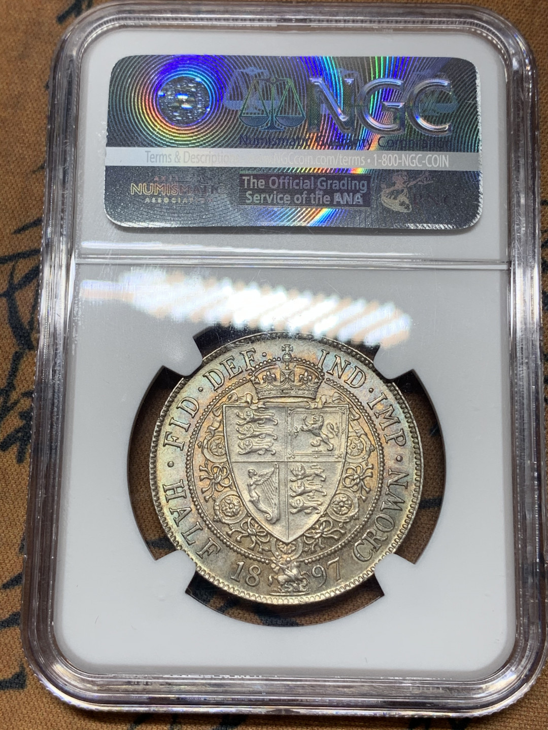 《竞宝斋》钱币微拍-第18场-本周日，周一2场连拍（全场顺丰包邮） NGC MS61英国1897年1/2克朗 NGC编号：4312794-018 背面五彩