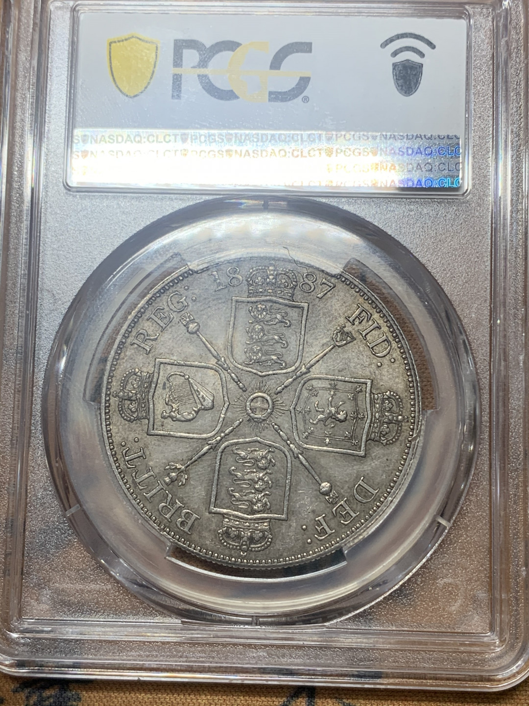 《竞宝斋》钱币微拍-第18场-本周日，周一2场连拍（全场顺丰包邮） NGC MS62英国1887年维多利亚高冠双弗洛林4S银币 五彩原光 