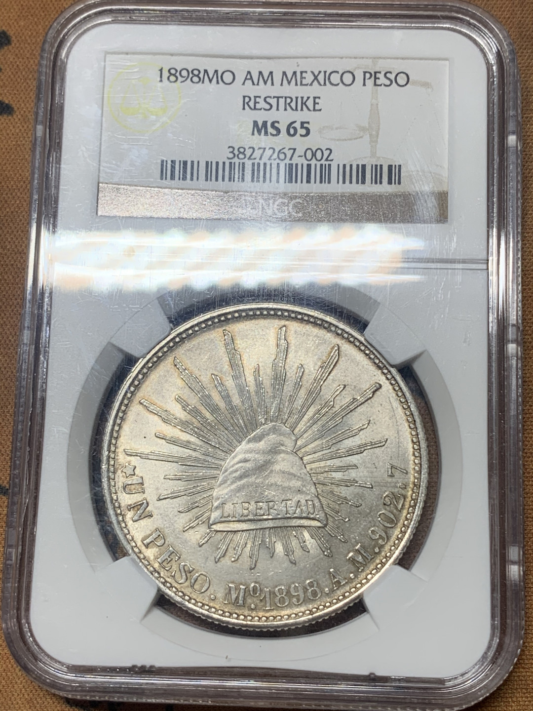 《竞宝斋》钱币微拍-第18场-本周日，周一2场连拍（全场顺丰包邮） NGC评级MS65 1898年墨西哥直边鹰洋（1949国民党后铸） 高分到位可珍藏