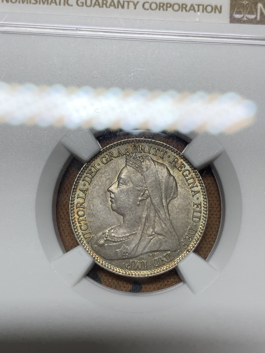 《竞宝斋》钱币微拍-第18场-本周日，周一2场连拍（全场顺丰包邮） NGC MS64 英国1897年6便士 NGC编号：5807938-004 双面五彩