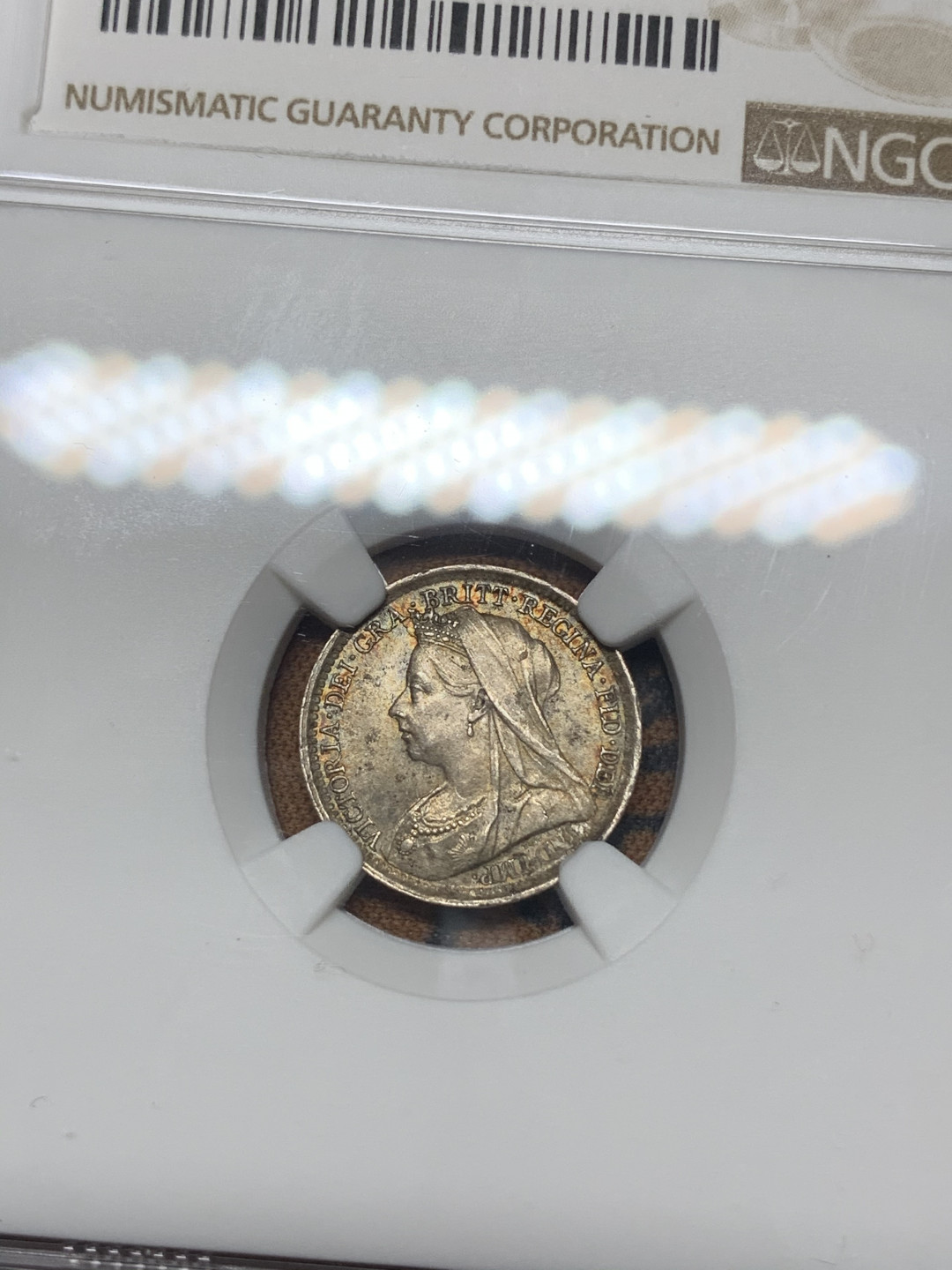 《竞宝斋》钱币微拍-第18场-本周日，周一2场连拍（全场顺丰包邮） NGC MS63 英国1897年3便士 NGC编号：4580021-010 双面五彩