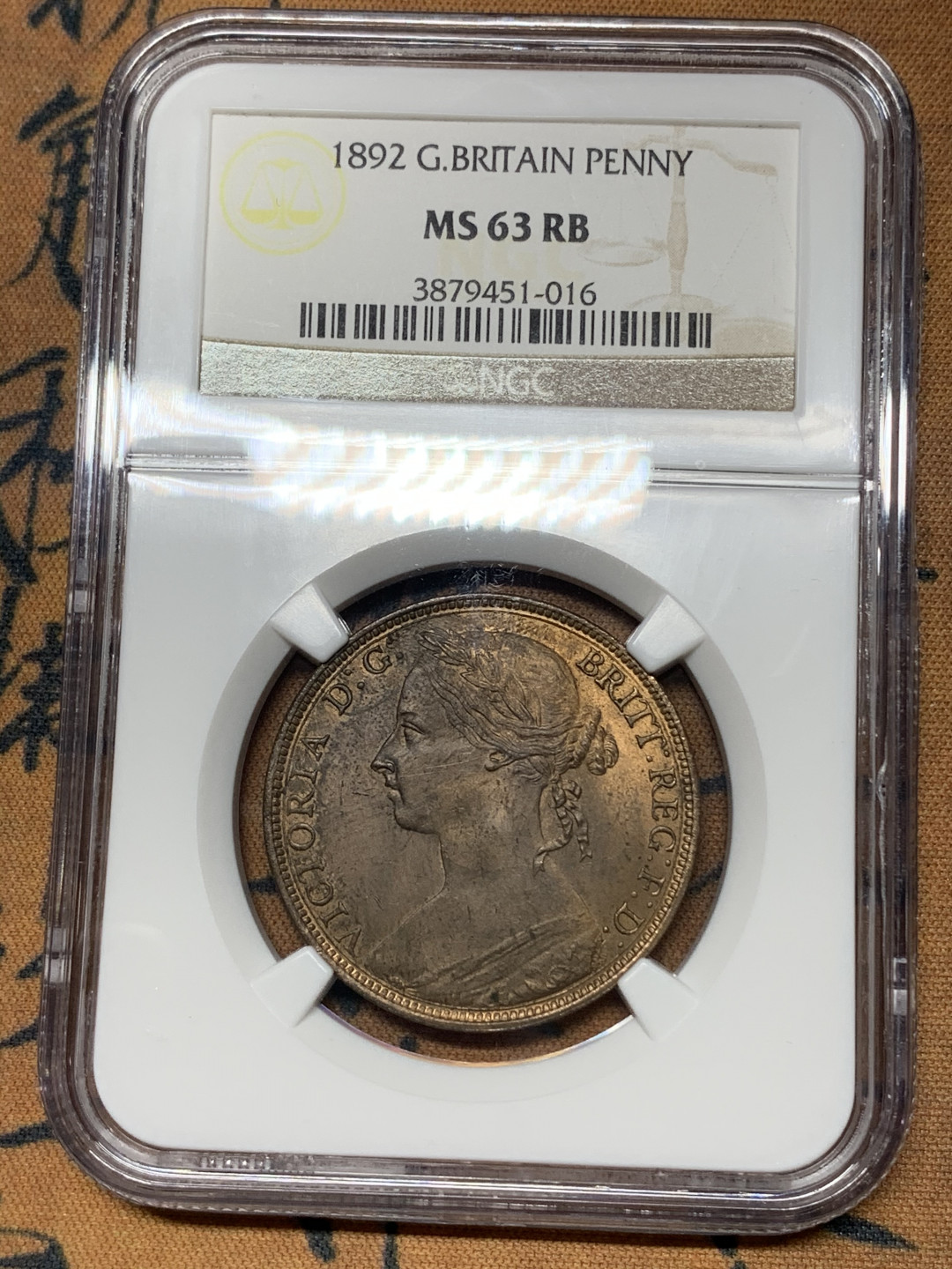 《竞宝斋》钱币微拍-第18场-本周日，周一2场连拍（全场顺丰包邮） NGC MS63RB 英国1892年1便士 NGC编号：3879451-016