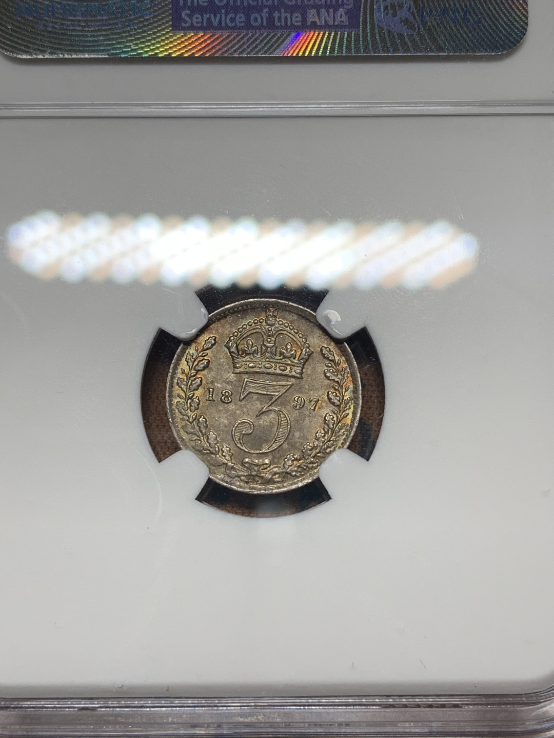 《竞宝斋》钱币微拍-第18场-本周日，周一2场连拍（全场顺丰包邮） NGC MS63 英国1897年3便士 NGC编号：4580021-010 双面五彩