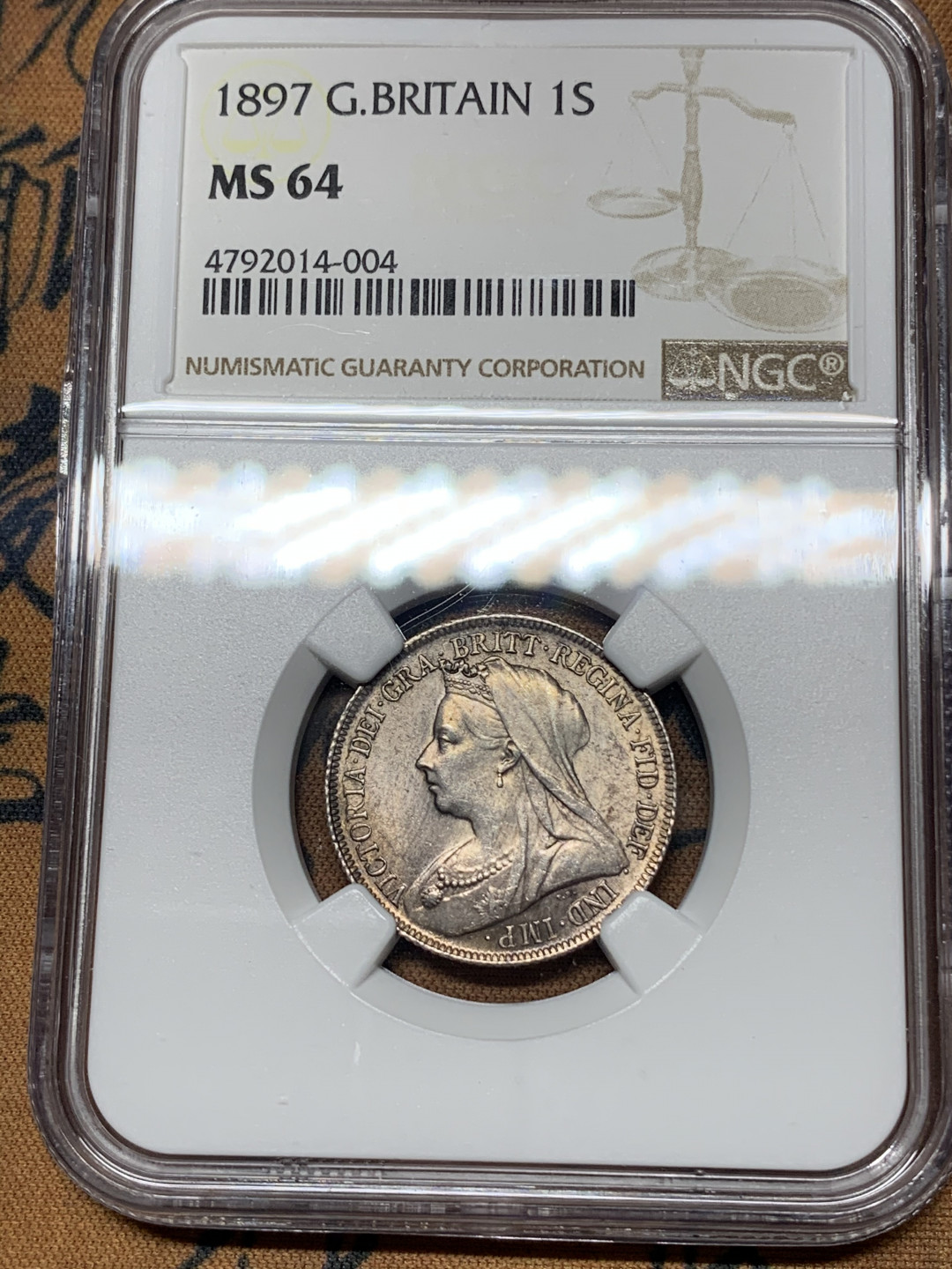 《竞宝斋》钱币微拍-第18场-本周日，周一2场连拍（全场顺丰包邮） NGC MS64 英国1897年1先令 NGC编号：4792014-004 双面五彩