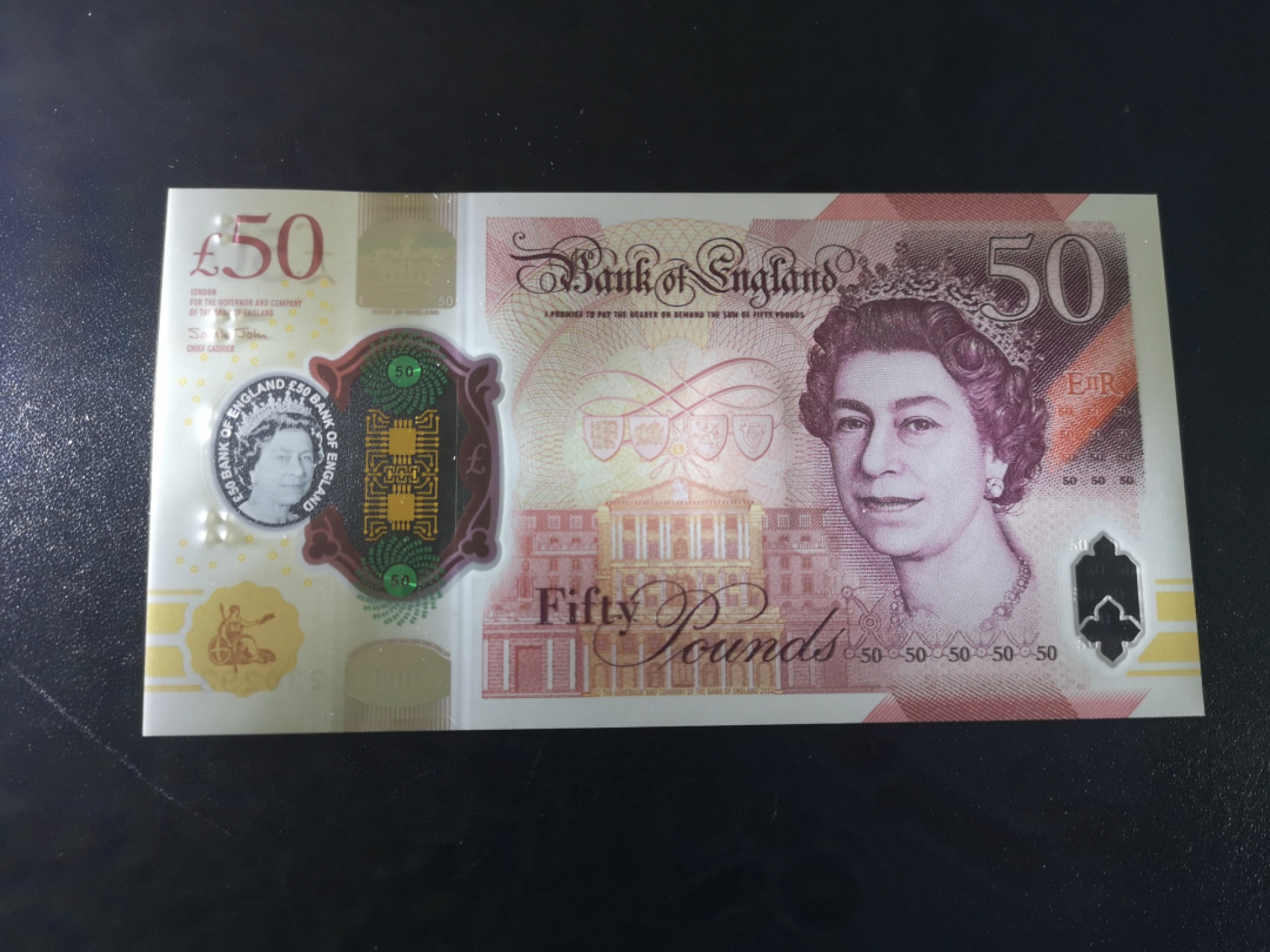 《外钞收藏家》第一百五十二期拍卖（本期98件） 2020年英国最新版50镑塑料钞 AA01首发冠 无47
