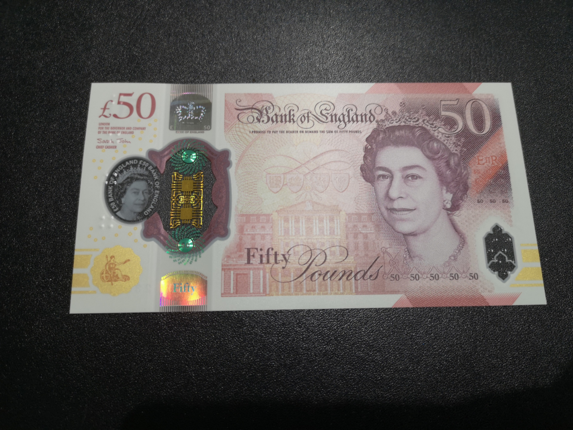 《外钞收藏家》第一百五十二期拍卖（本期98件） 2020年英国最新版50镑塑料钞 AA01首发冠 无47
