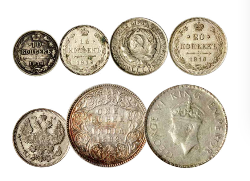 如见仁心·致远堂藏中国机制银币 1915-1916年俄罗斯双头鹰卢布10戈比、15戈比、20戈比等五枚，另有1882年、1941年印度卢比各一枚，近未使用品