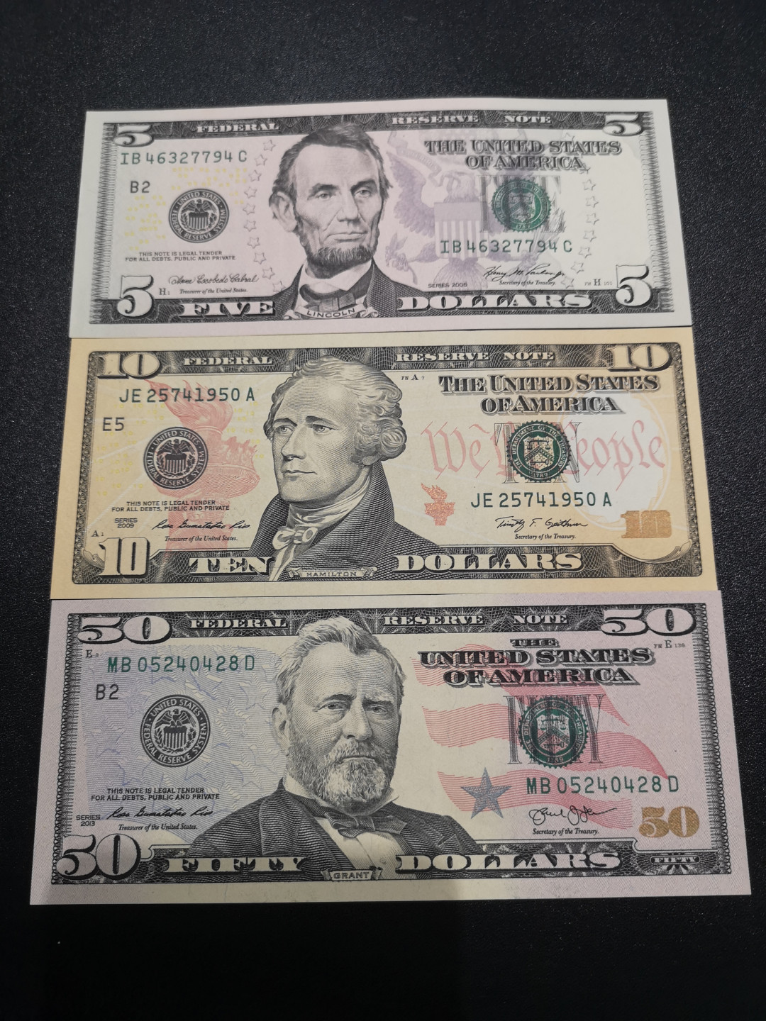 《外钞收藏家》第一百五十三期拍卖（本期94件） 2006-2013年美元50、10、5元各一枚 近全新 有潮癍
