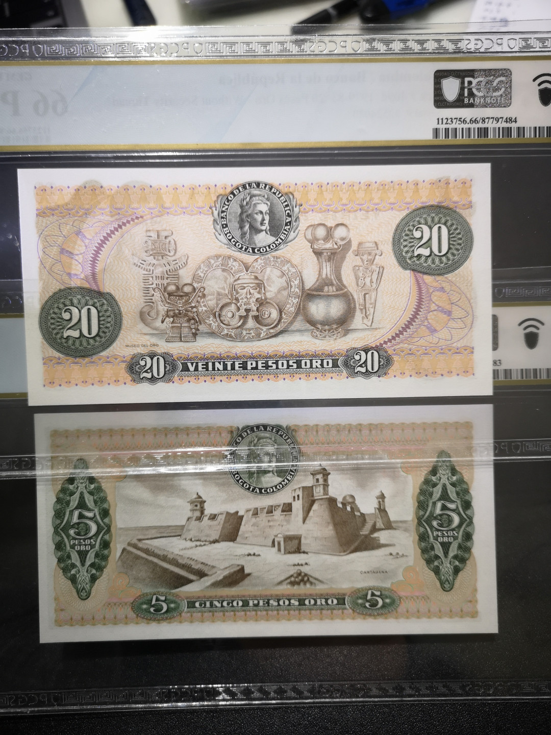 《外钞收藏家》第一百五十三期拍卖（本期94件） 哥伦比亚5、20比索两张一起  PCGS评级
