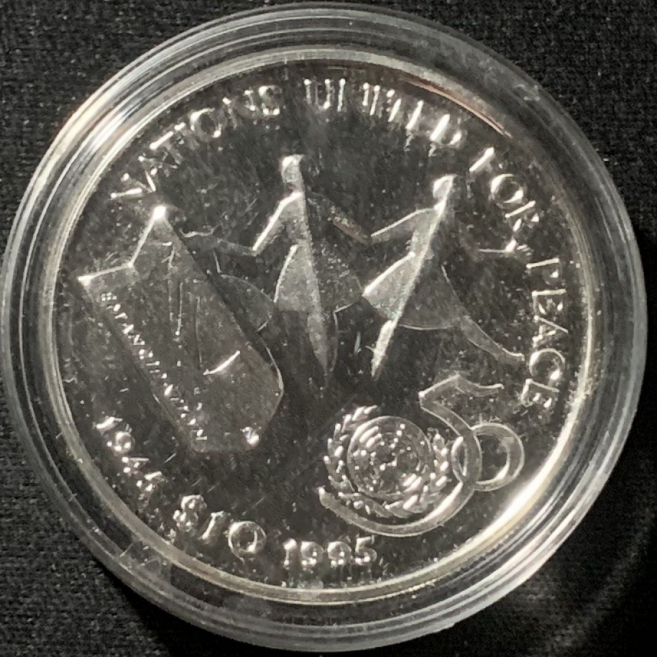 紫瑗钱币——第162期拍卖 利比里亚 1995年 联合国成立50周年 10元 31.1克 0.999银 精制