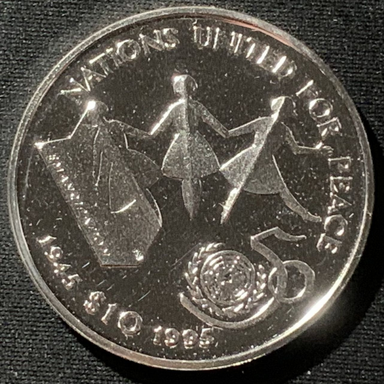 紫瑗钱币——第162期拍卖 利比里亚 1995年 联合国成立50周年 10元 31.1克 0.999银 精制