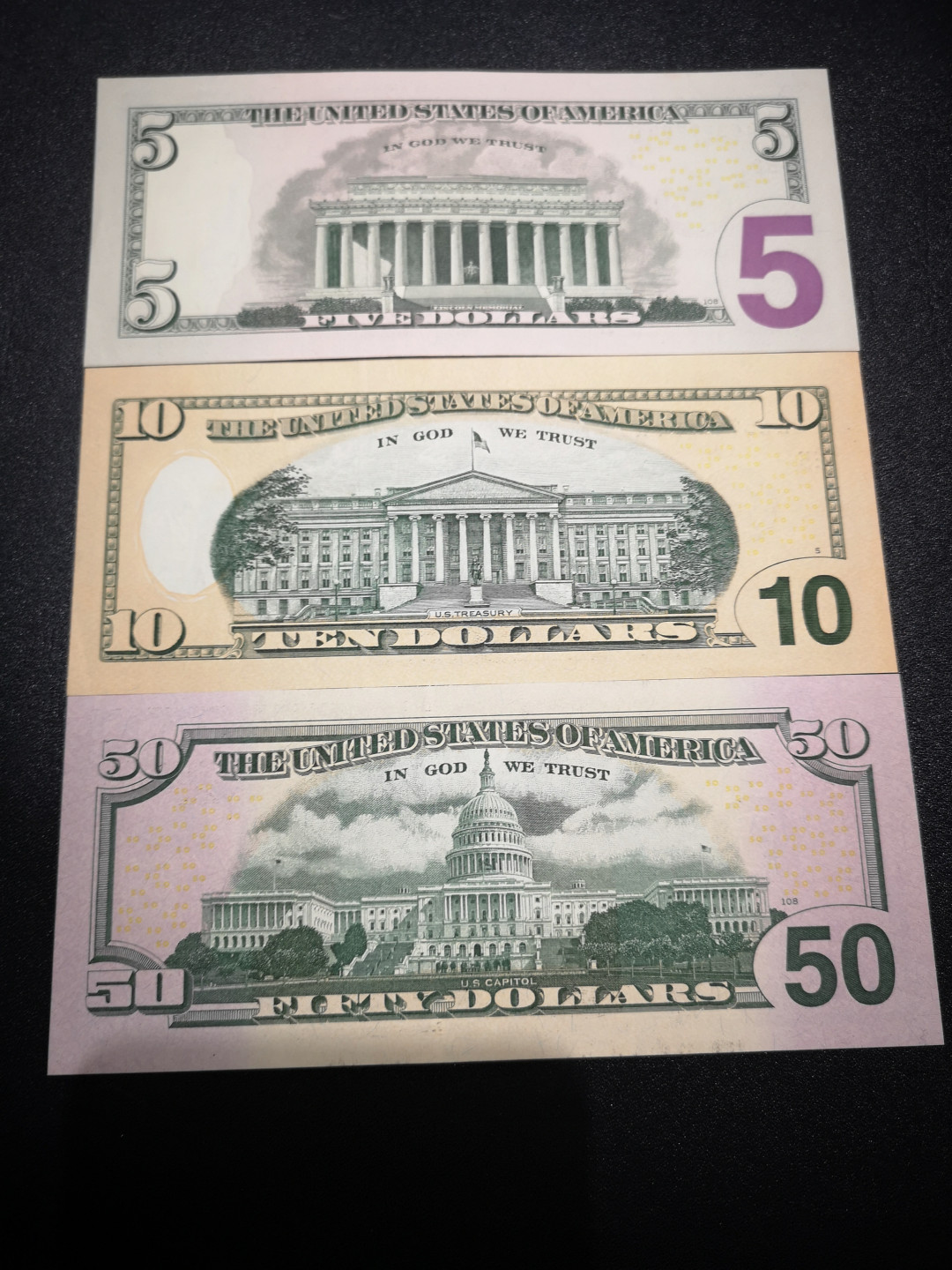 《外钞收藏家》第一百五十三期拍卖（本期94件） 2006-2013年美元50、10、5元各一枚 近全新 有潮癍