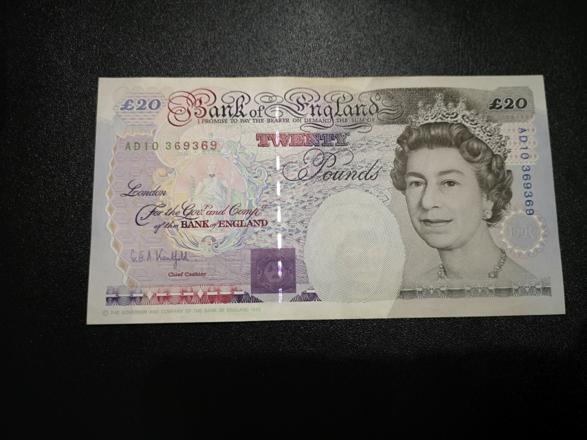 《外钞收藏家》第一百五十三期拍卖（本期94件） 英国E序列20镑 VF品相 369369重复号