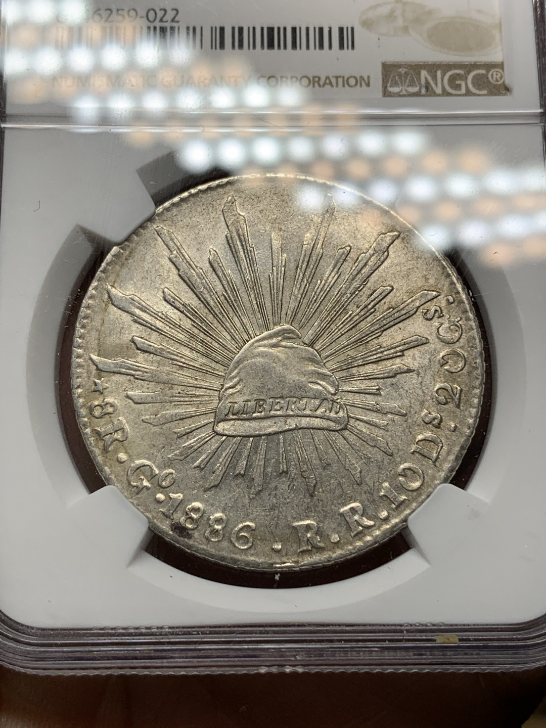 《竞宝斋》钱币微拍-第21场-本周日，周一2场连拍（全场顺丰包邮） NGC-UNCD  墨西哥 1886/76年 8 里亚尔  瓜纳华托厂  银币      淡彩 骑字GO老鹰 