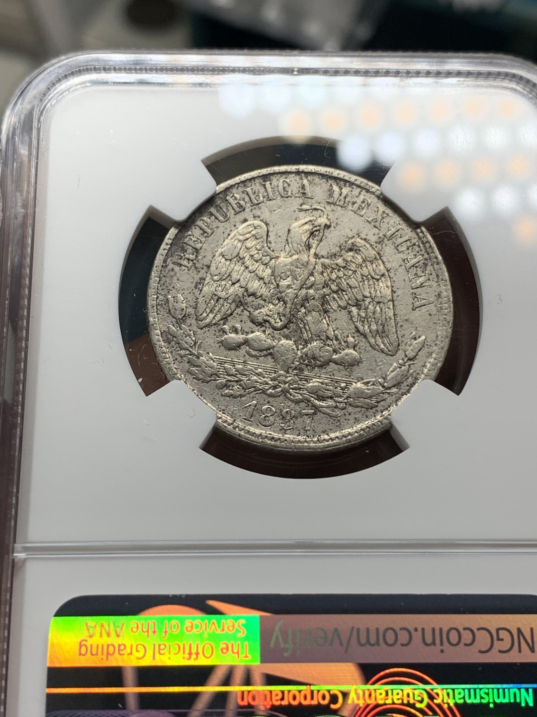 《竞宝斋》钱币微拍-第21场-本周日，周一2场连拍（全场顺丰包邮） NGC-AUD  墨西哥天平鹰洋半圆   mo 1887  原味老包浆  非常少的品种