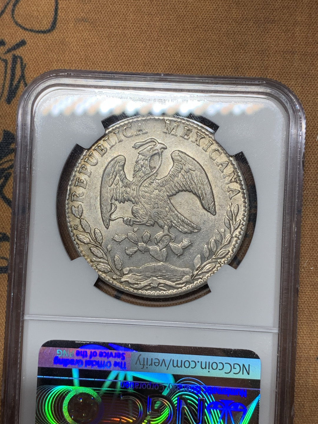 《竞宝斋》钱币微拍-第21场-本周日，周一2场连拍（全场顺丰包邮） NGC-UNCD  墨西哥 1886/76年 8 里亚尔  瓜纳华托厂  银币      淡彩 骑字GO老鹰 