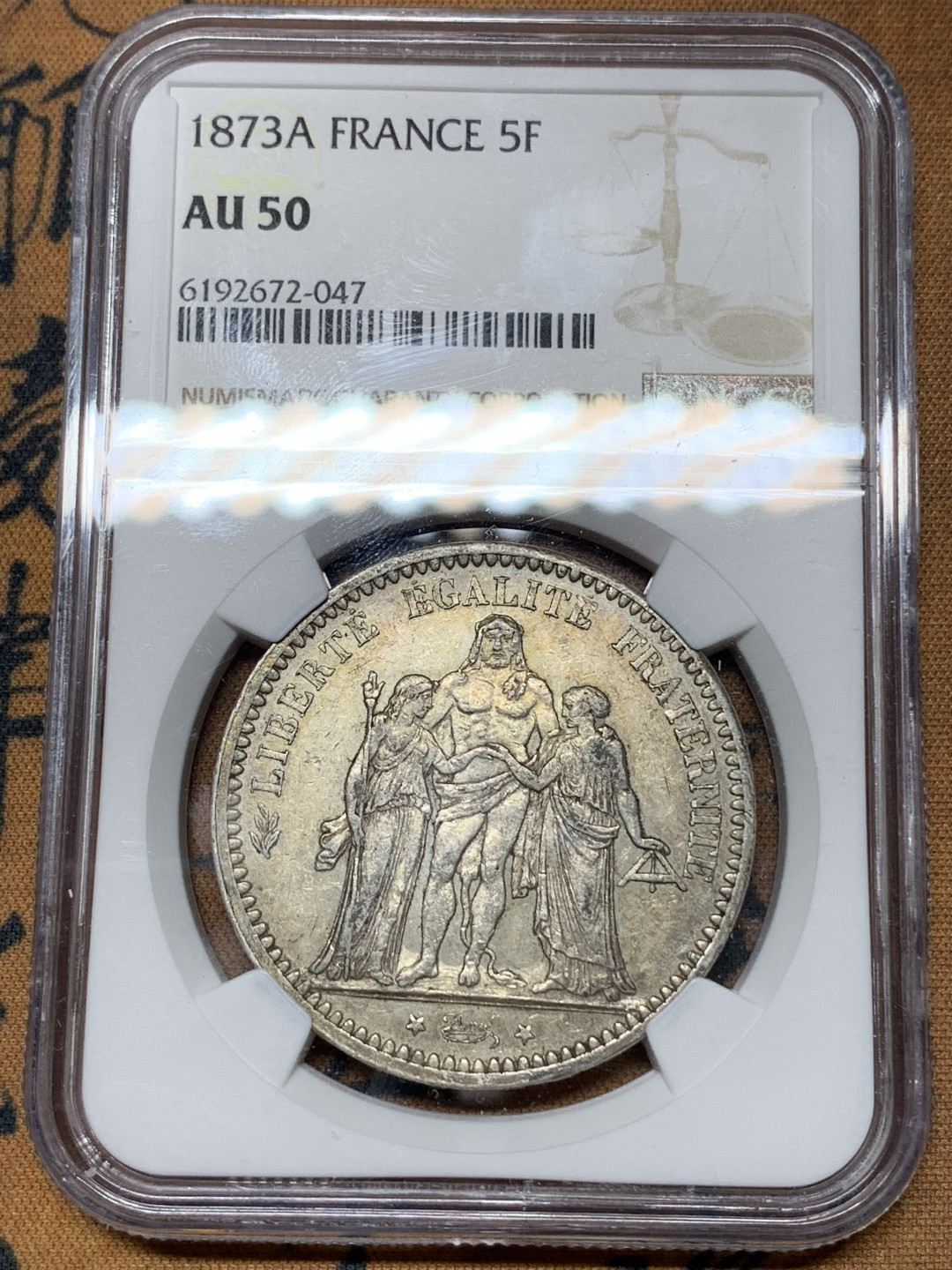 《竞宝斋》钱币微拍-第21场-本周日，周一2场连拍（全场顺丰包邮） NGC-AU50 法国 1873年 大力神 5法郎 大银币