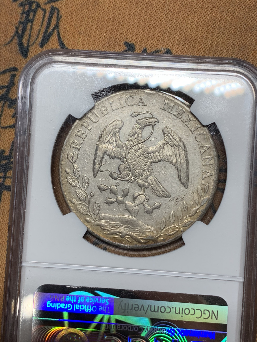 《竞宝斋》钱币微拍-第21场-本周日，周一2场连拍（全场顺丰包邮） NGC-AUD  墨西哥 1889年 8 里亚尔  埃西莫约厂  银币     原味带彩HO厂老鹰