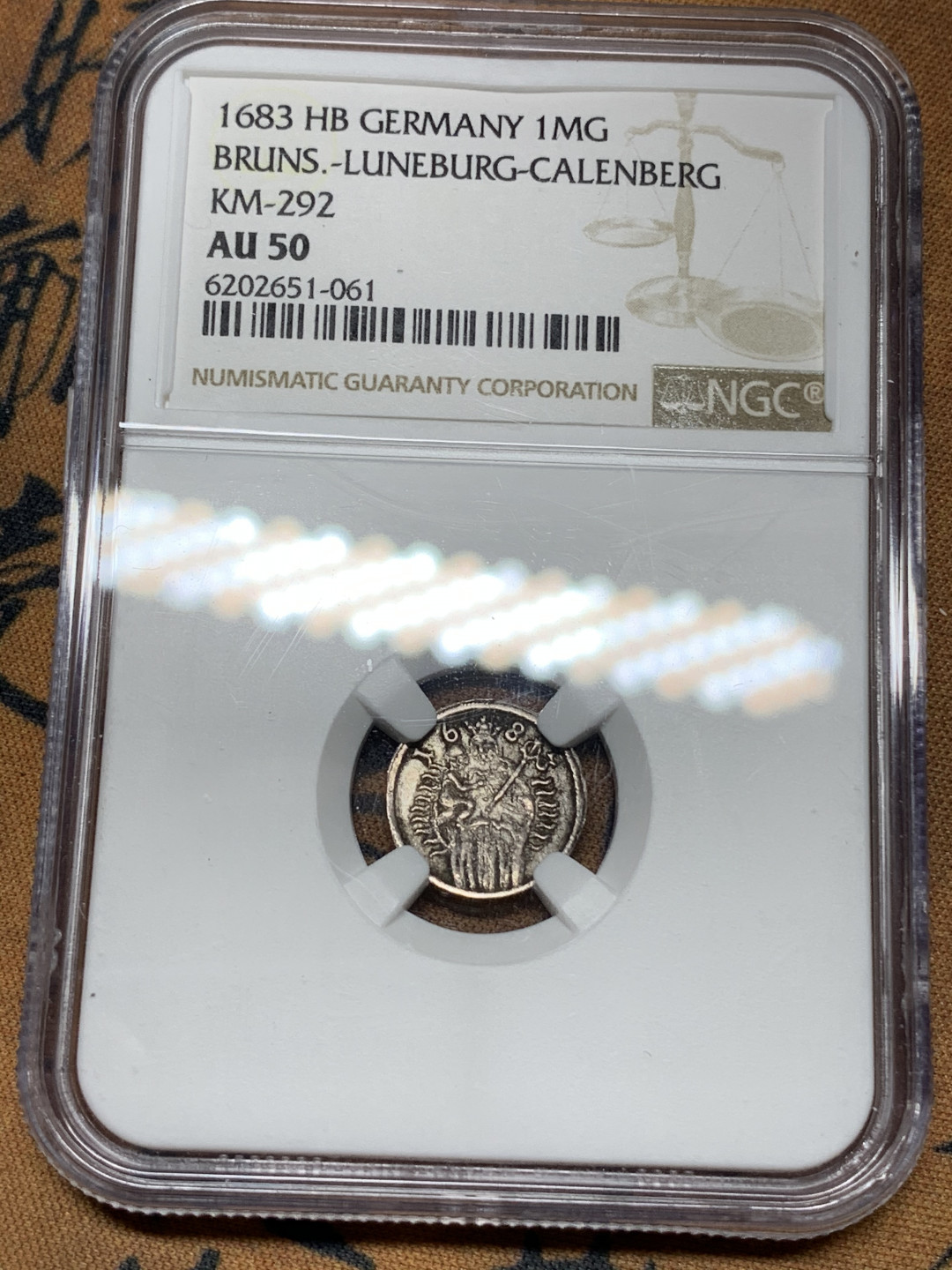 《竞宝斋》钱币微拍-第21场-本周日，周一2场连拍（全场顺丰包邮） NGC AU50 德国布伦瑞克1683年 圣母抱婴1M银币  亚军分