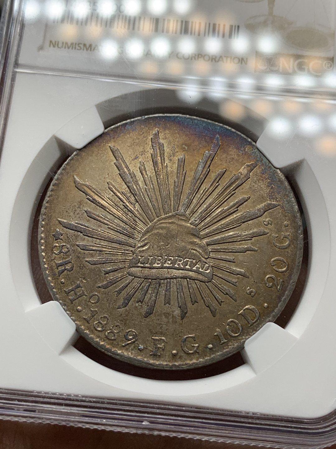 《竞宝斋》钱币微拍-第21场-本周日，周一2场连拍（全场顺丰包邮） NGC-AUD  墨西哥 1889年 8 里亚尔  埃西莫约厂  银币     原味带彩HO厂老鹰