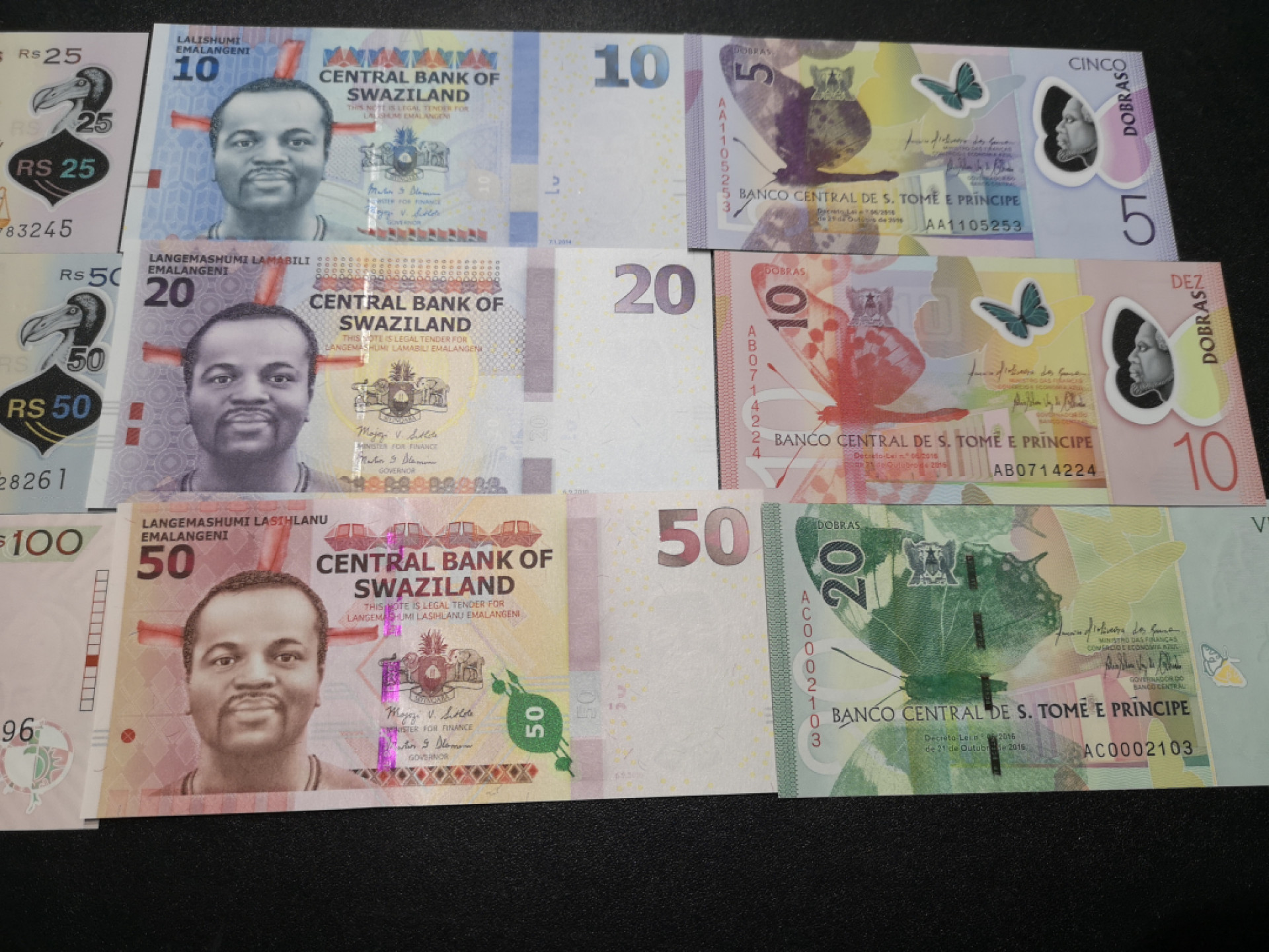 《外钞收藏家》第一百五十五期拍卖 双连拍第二场（本期59件）） 加纳、毛里求斯、斯威士兰、多美尼亚 每国三张小套 全新UNC