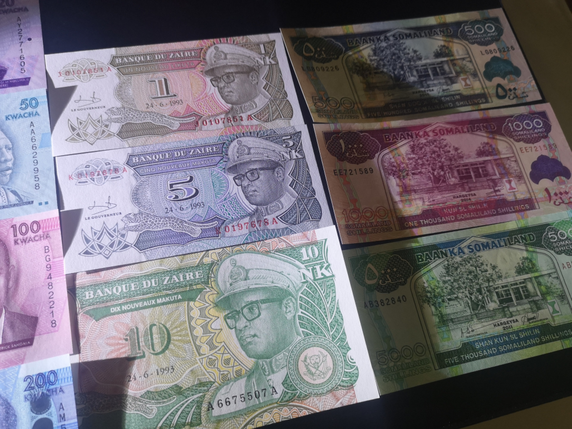 《外钞收藏家》第一百五十五期拍卖 双连拍第二场（本期59件）） 几内亚比绍、尼日利亚、马拉维、刚果民主、索马里兰 每国三、四张小套 全新UNC