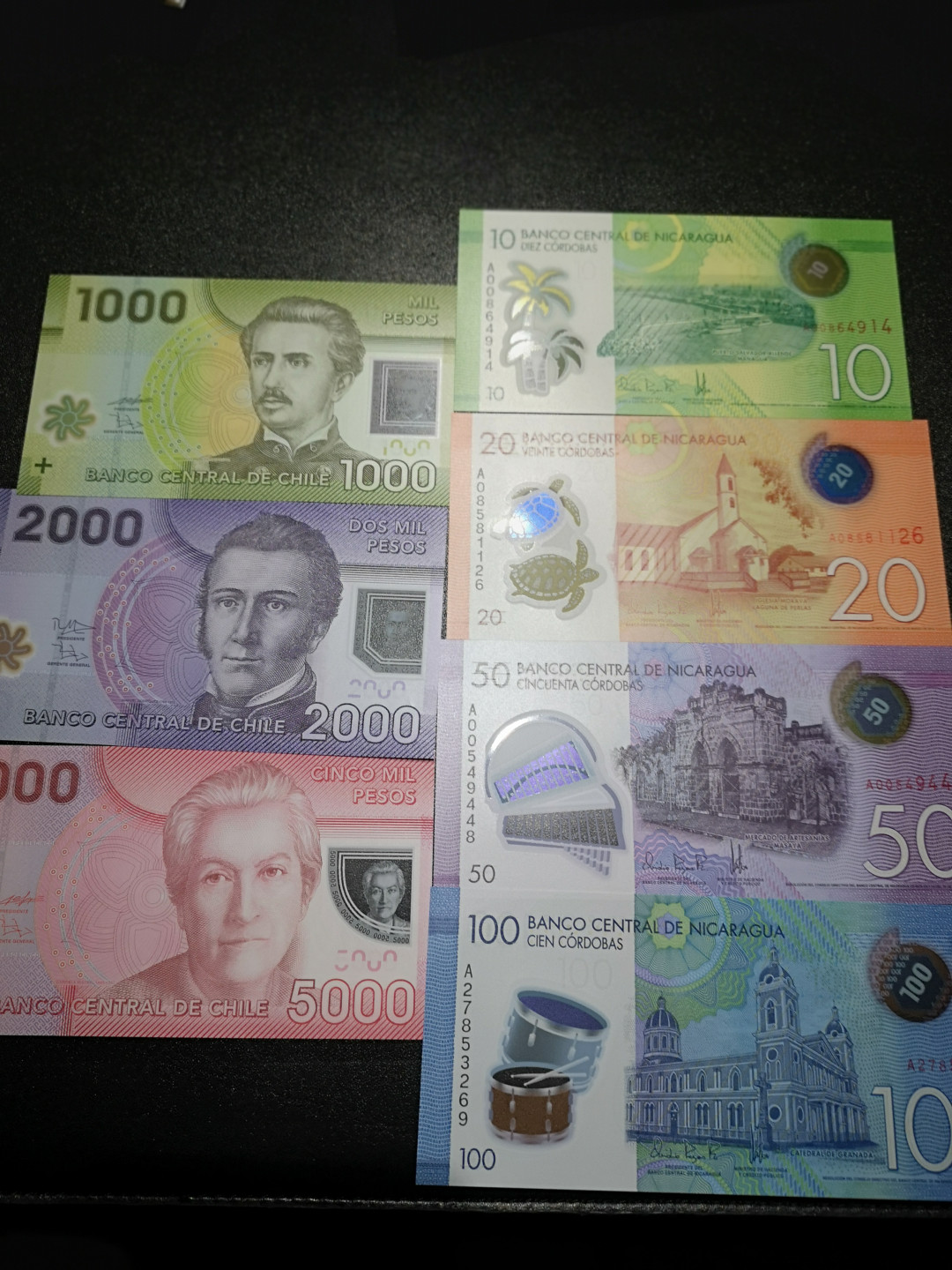 《外钞收藏家》第一百五十五期拍卖 双连拍第二场（本期59件）） 智利和尼加拉瓜 共7张 全新UNC