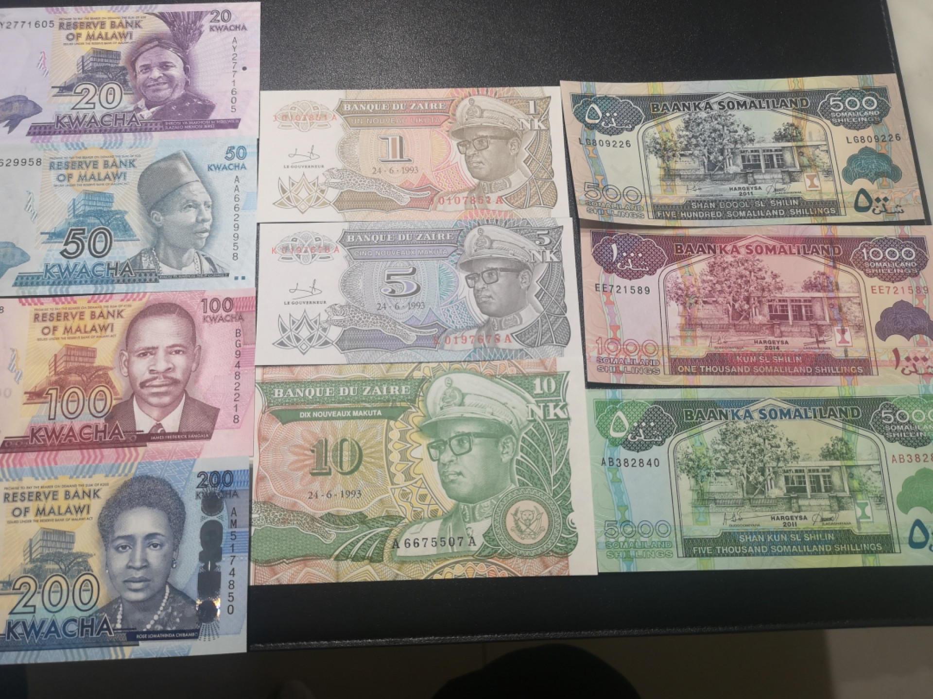 《外钞收藏家》第一百五十五期拍卖 双连拍第二场（本期59件）） 几内亚比绍、尼日利亚、马拉维、刚果民主、索马里兰 每国三、四张小套 全新UNC