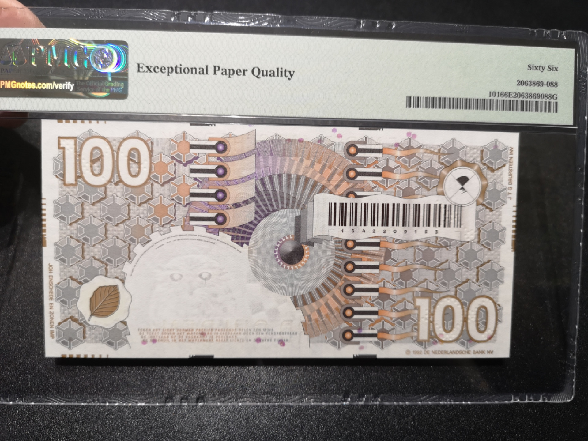 《外钞收藏家》第一百五十七期拍卖（本期62件）（连拍场） 1992年荷兰齿轮版100盾 PMG66