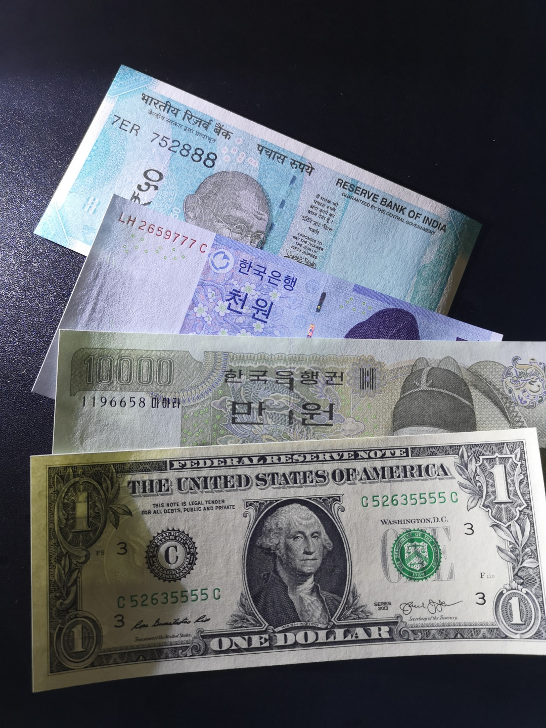 《外钞收藏家》第一百五十七期拍卖（本期62件）（连拍场） 韩元1万、1000韩元777豹子号、美元狮子号、印度888豹子 全新UNC