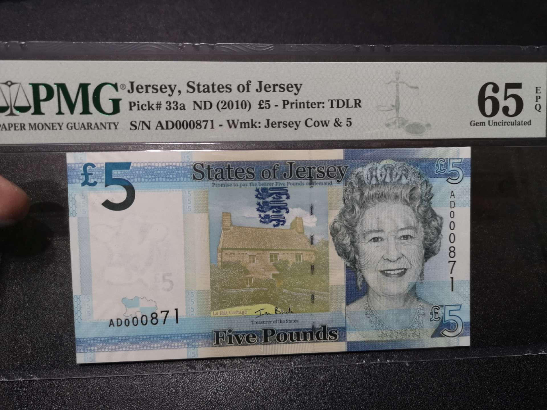 《外钞收藏家》第一百五十七期拍卖（本期62件）（连拍场） 2010年泽西女王5镑871号  PMG65