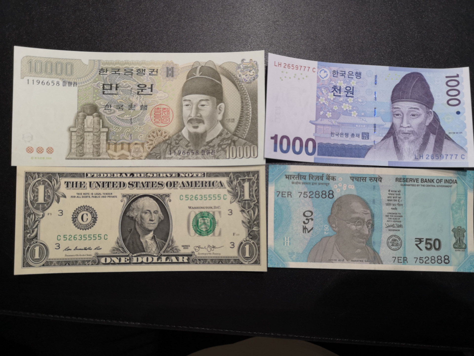 《外钞收藏家》第一百五十七期拍卖（本期62件）（连拍场） 韩元1万、1000韩元777豹子号、美元狮子号、印度888豹子 全新UNC