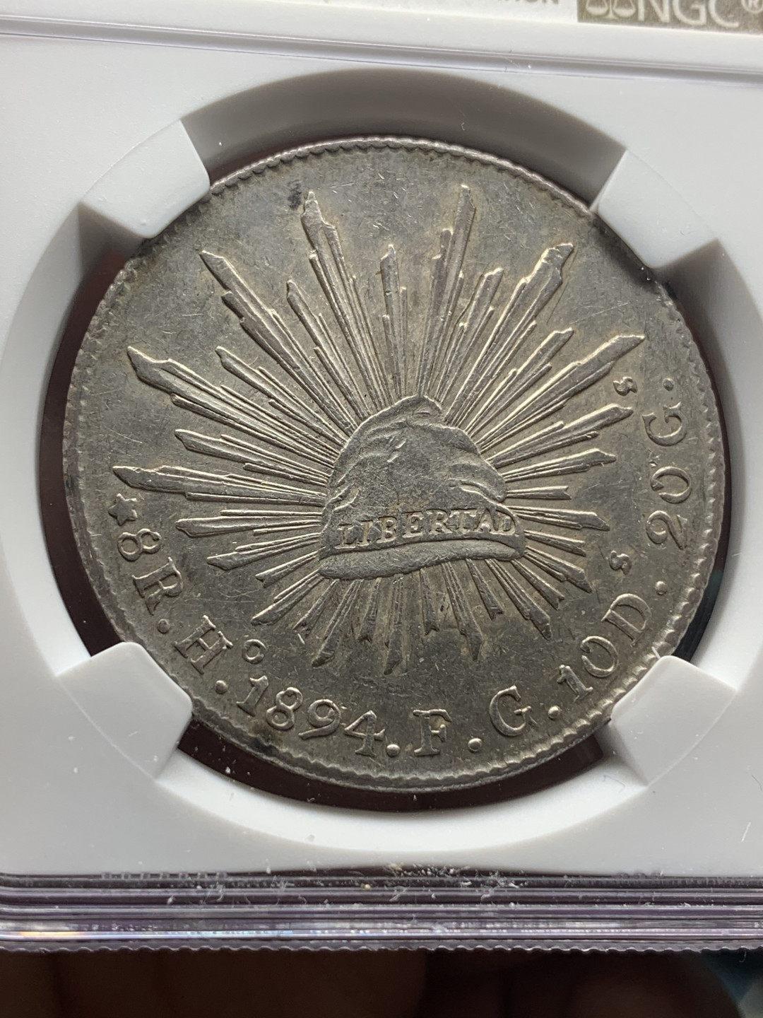 《竞宝斋》钱币微拍-第23场（全场顺丰包邮） NGC-AU55  墨西哥 1894年 8 里亚尔  埃西莫约厂  银币     原味带彩HO厂老鹰