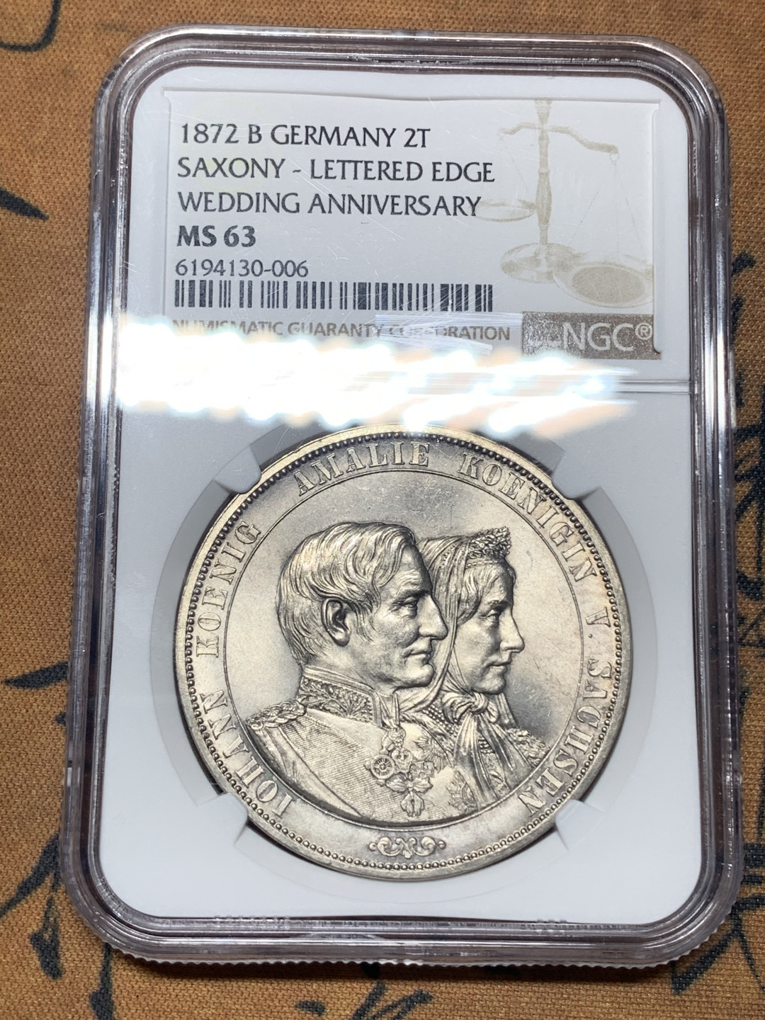 《竞宝斋》钱币微拍-第23场（全场顺丰包邮） ngc-ms63 1872年萨克森金婚泰勒 原光大银包浆舒服 远超马克的工艺和浮雕 细节丰富 37g拿在手里很满足 发行量4.8万枚 最后的两泰勒 关门币