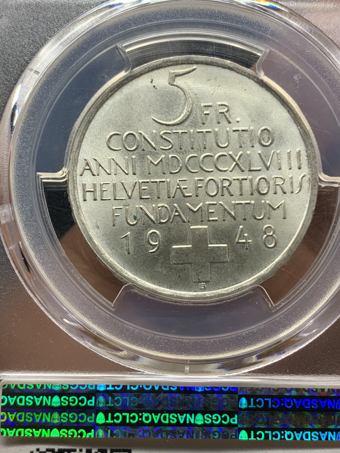 《竞宝斋》钱币微拍-第23场（全场顺丰包邮） pcgs-ms65 1948年瑞士5法郎银币 宪法百年纪念 车轮光状态佳 银光四溢 有磨砂感 正面是瑞士女神赫尔维蒂娅的裸体形象 支撑角有损