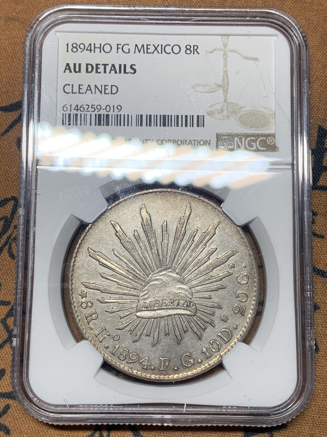 《竞宝斋》钱币微拍-第23场（全场顺丰包邮） NGC-AUD  墨西哥 1894年 8 里亚尔  埃西莫约厂  银币     原味带彩HO厂老鹰