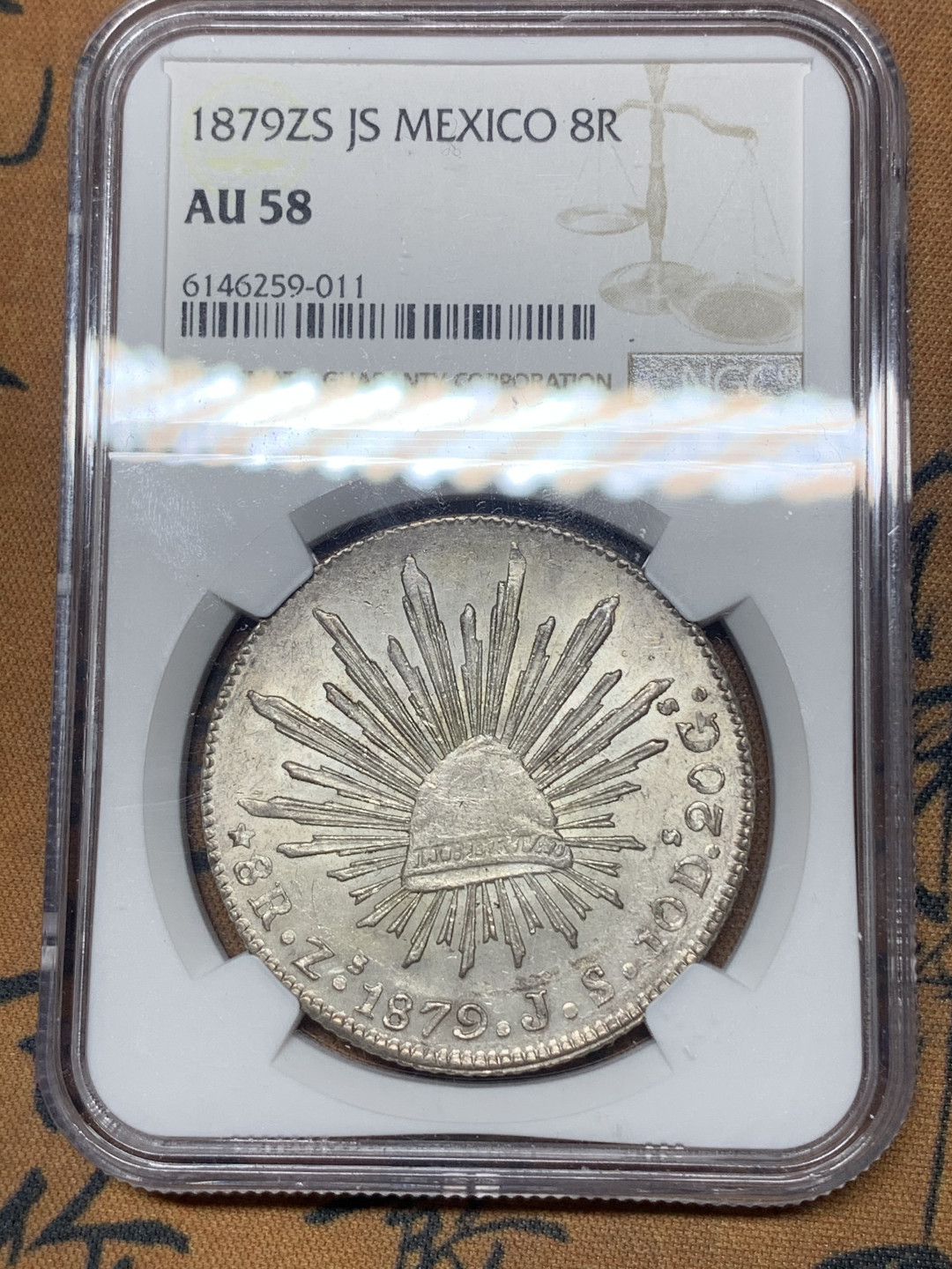 《竞宝斋》钱币微拍-第23场（全场顺丰包邮） NGC-AU58  墨西哥 1879年 8 里亚尔  萨斯特卡斯厂  银币     原味粉光 中期老鹰