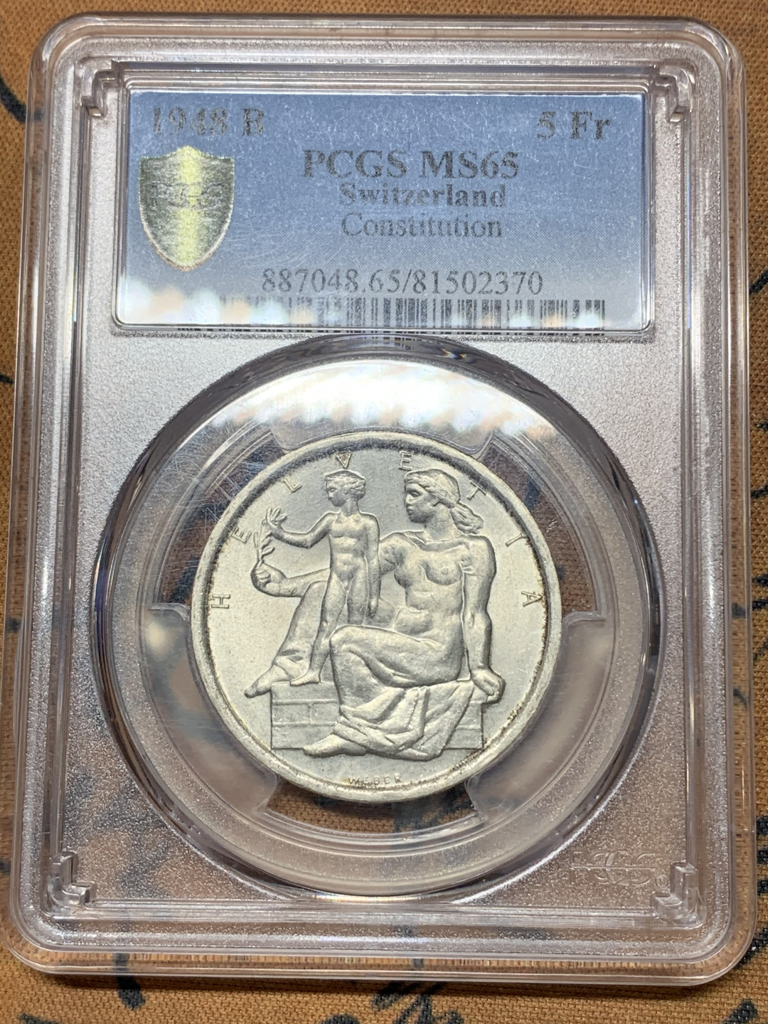 《竞宝斋》钱币微拍-第23场（全场顺丰包邮） pcgs-ms65 1948年瑞士5法郎银币 宪法百年纪念 车轮光状态佳 银光四溢 有磨砂感 正面是瑞士女神赫尔维蒂娅的裸体形象 支撑角有损