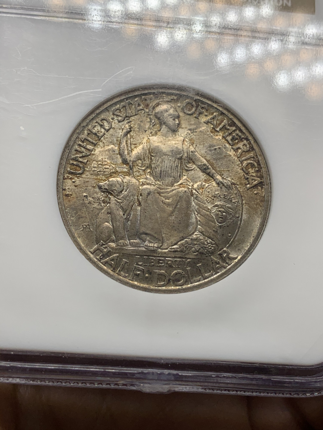 《竞宝斋》钱币微拍-第23场（全场顺丰包邮） ngc-ms65 美国1935年圣迭戈半圆 90年的老盒子严评 女神白熊大钟楼 丝绸光 细节锐利 双面通体深杏色黄油包浆 实物观感极佳