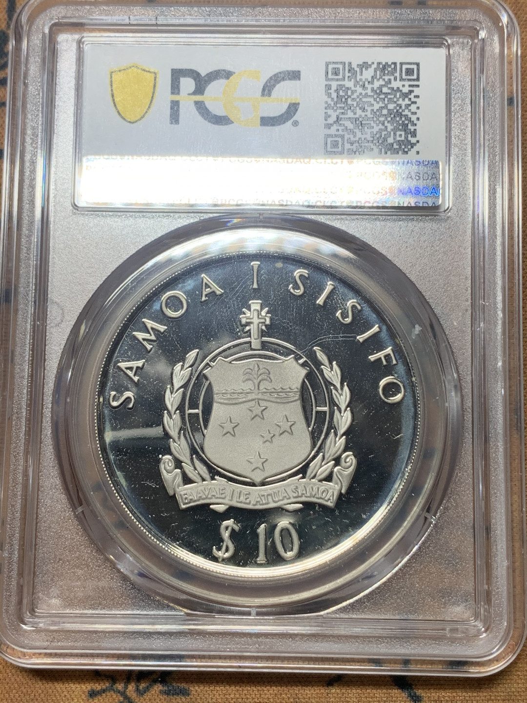 《竞宝斋》钱币微拍-第23场（全场顺丰包邮） PCGS PR68DCAM 萨摩亚1986年10塔拉精制大银币 925银，重量31g，直径38.7mm。