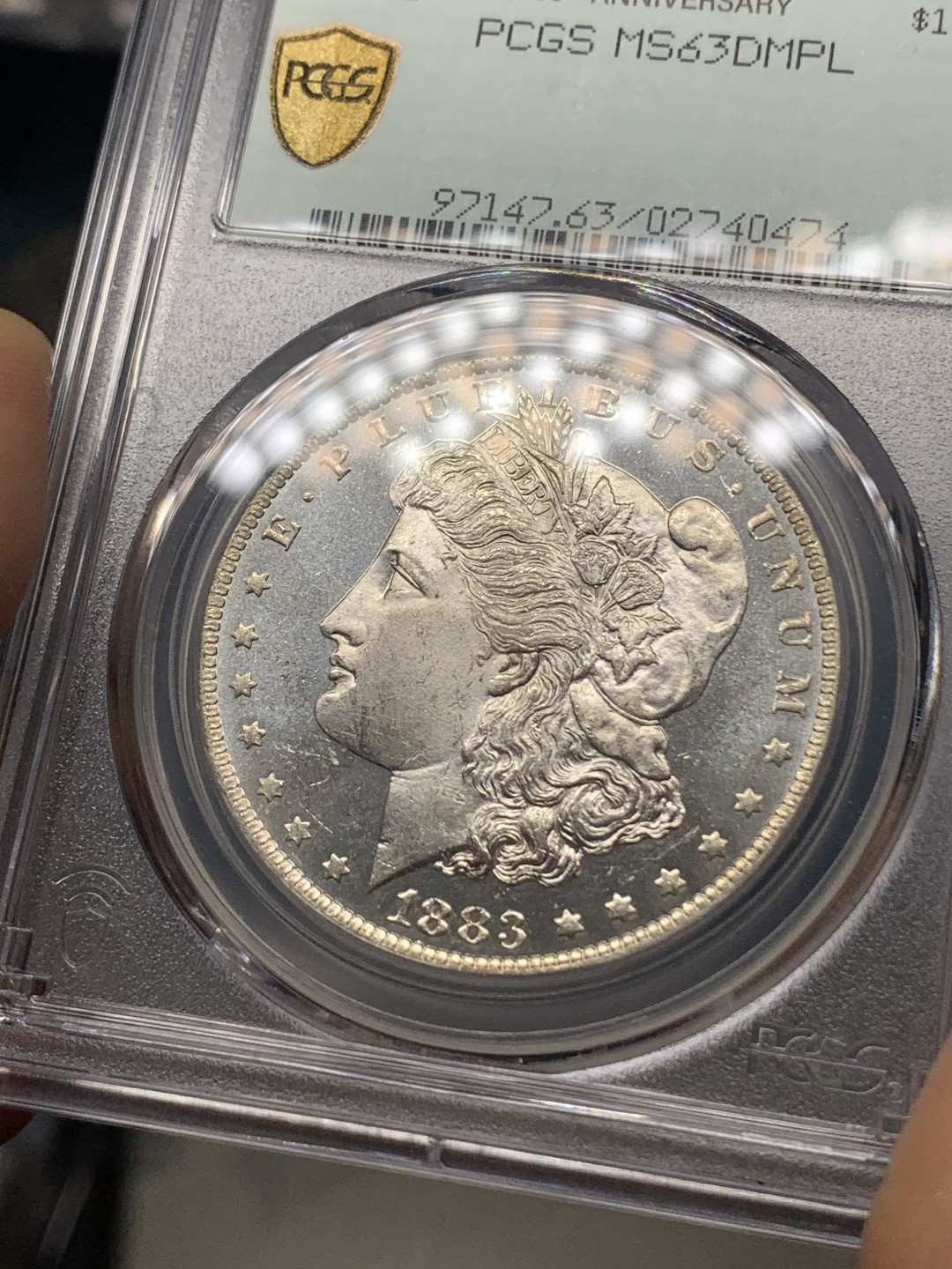 《竞宝斋》钱币微拍-第23场（全场顺丰包邮） PCGS-MS63DMPL 美国摩根币 1883年 新奥尔良厂 深打镜面+35周年盒