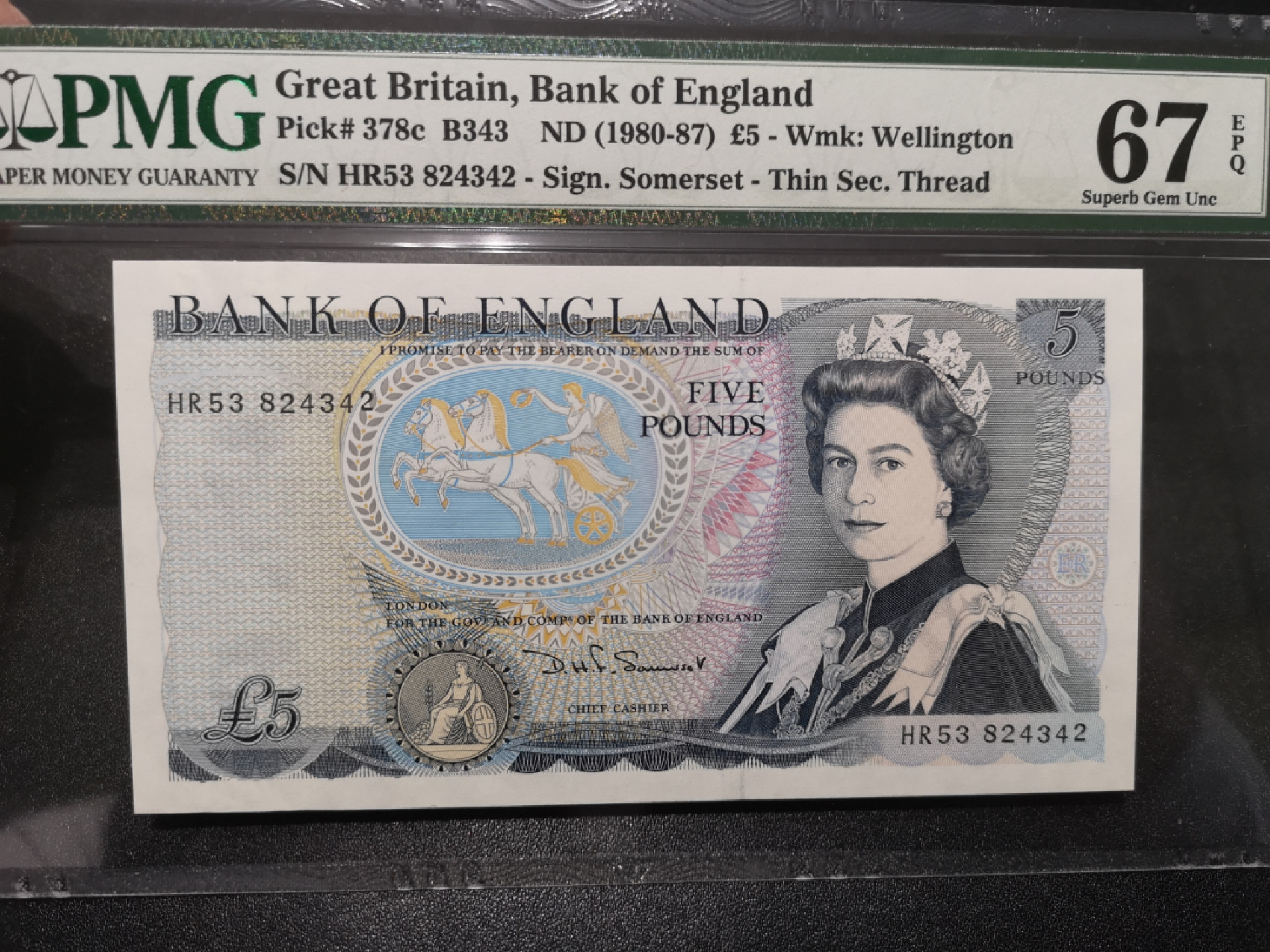 《外钞收藏家》第一百五十八期拍卖（本期111件） 英国D序列5镑 PMG67（378c）